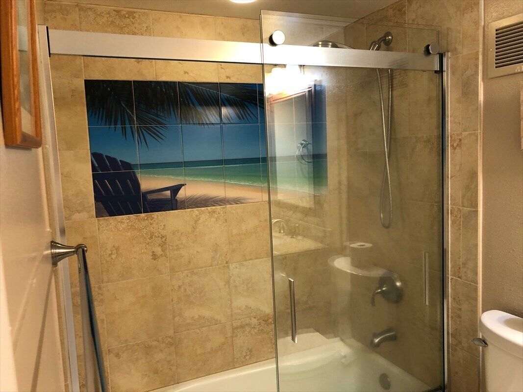 Shower, towels, soap, toilet paper