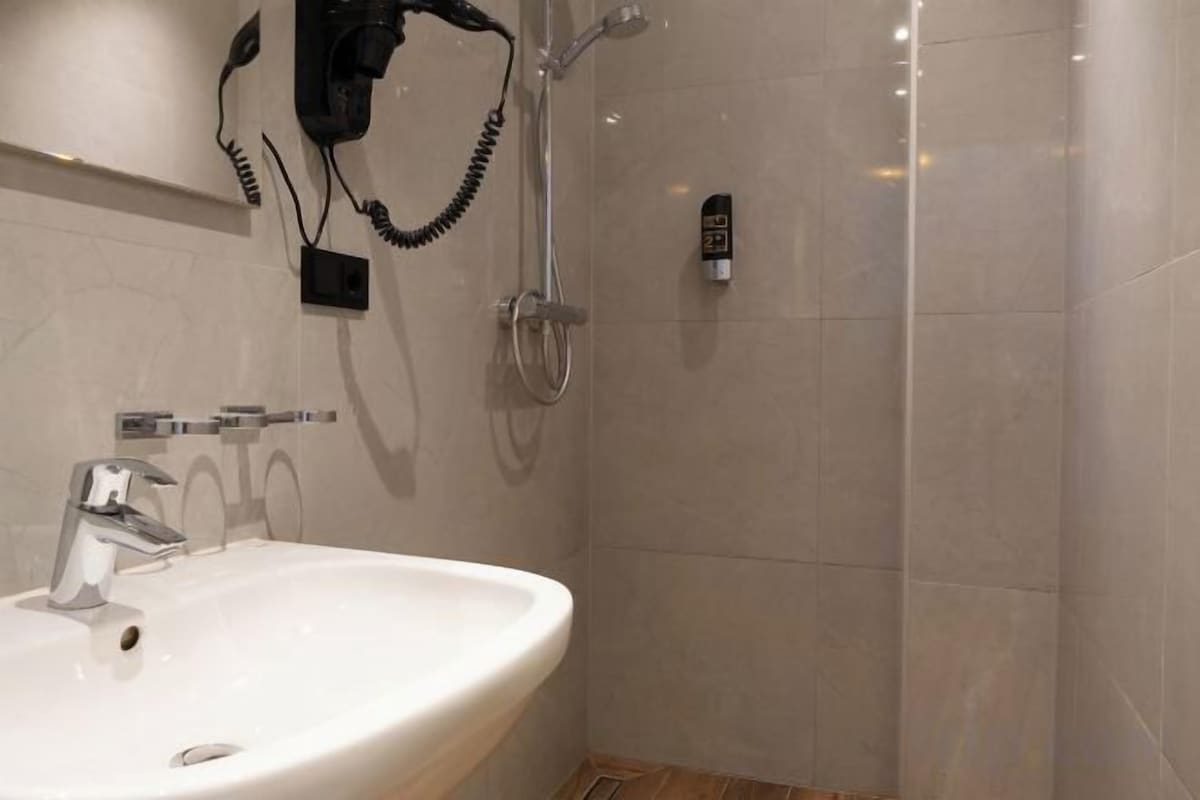 Bathroom | Shower, hair dryer, towels