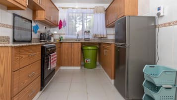 Casa | Cocina privada | Frigorífico, microondas, horno y hervidor eléctrico