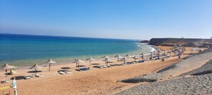 Private beach, sun-loungers, beach umbrellas, beach yoga