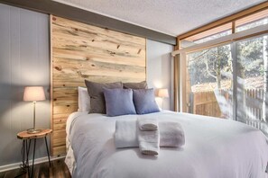 4 bedrooms, premium bedding, laptop workspace, iron/ironing board