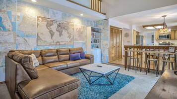 Flat-screen TV, fireplace, foosball, offices