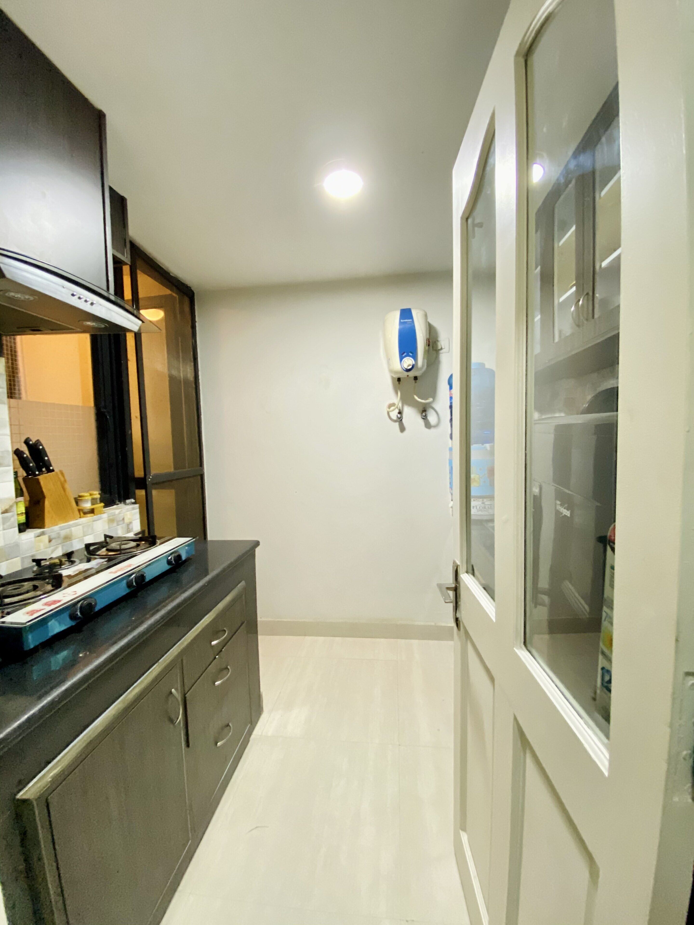 Fridge, stovetop, cookware/dishes/utensils, spices