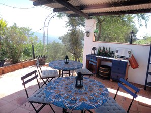 Outdoor dining - Great 1 Bedroom Studio with wonderful views, Swimming Pool and Jacuzzi (Comares)