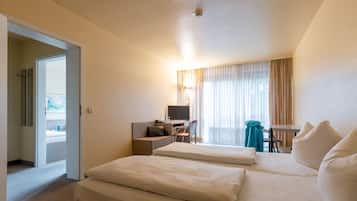 Family Room | Hypo-allergenic bedding, desk, laptop workspace, bed sheets