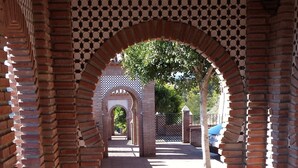 A brick pathway with arches and a tiled floor. - Great 2 Bedroom Apartment with wonderful views, Swimming Pool and Jacuzzi (Comares)