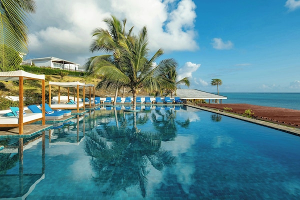 Outdoor pool, open 6:30 AM to 7:00 PM, free cabanas, pool umbrellas