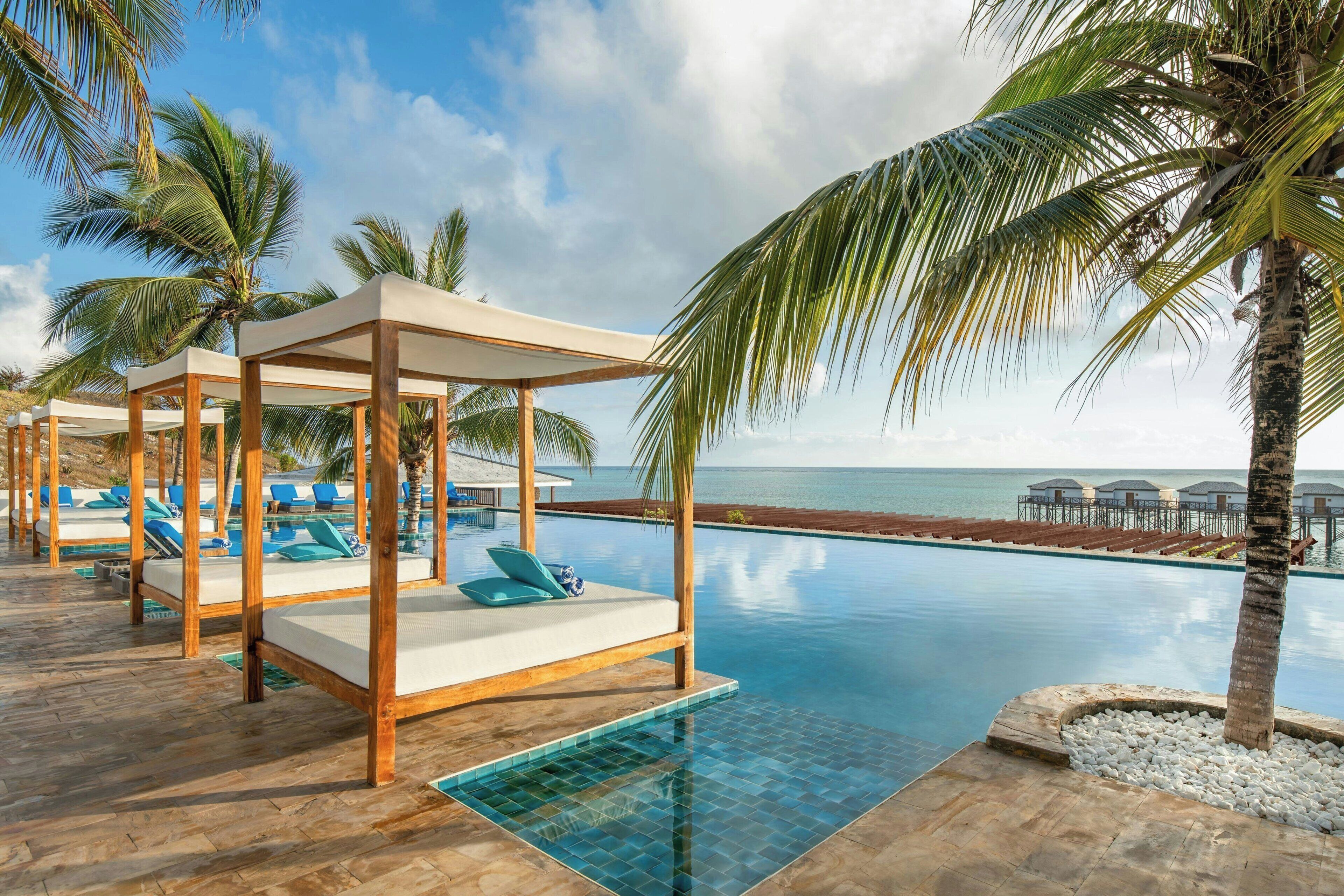 outdoor pool, open 6:30 am to 7:00 pm, free pool cabanas, pool umbrellas