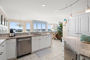 Microwave, dishwasher, dining tables
