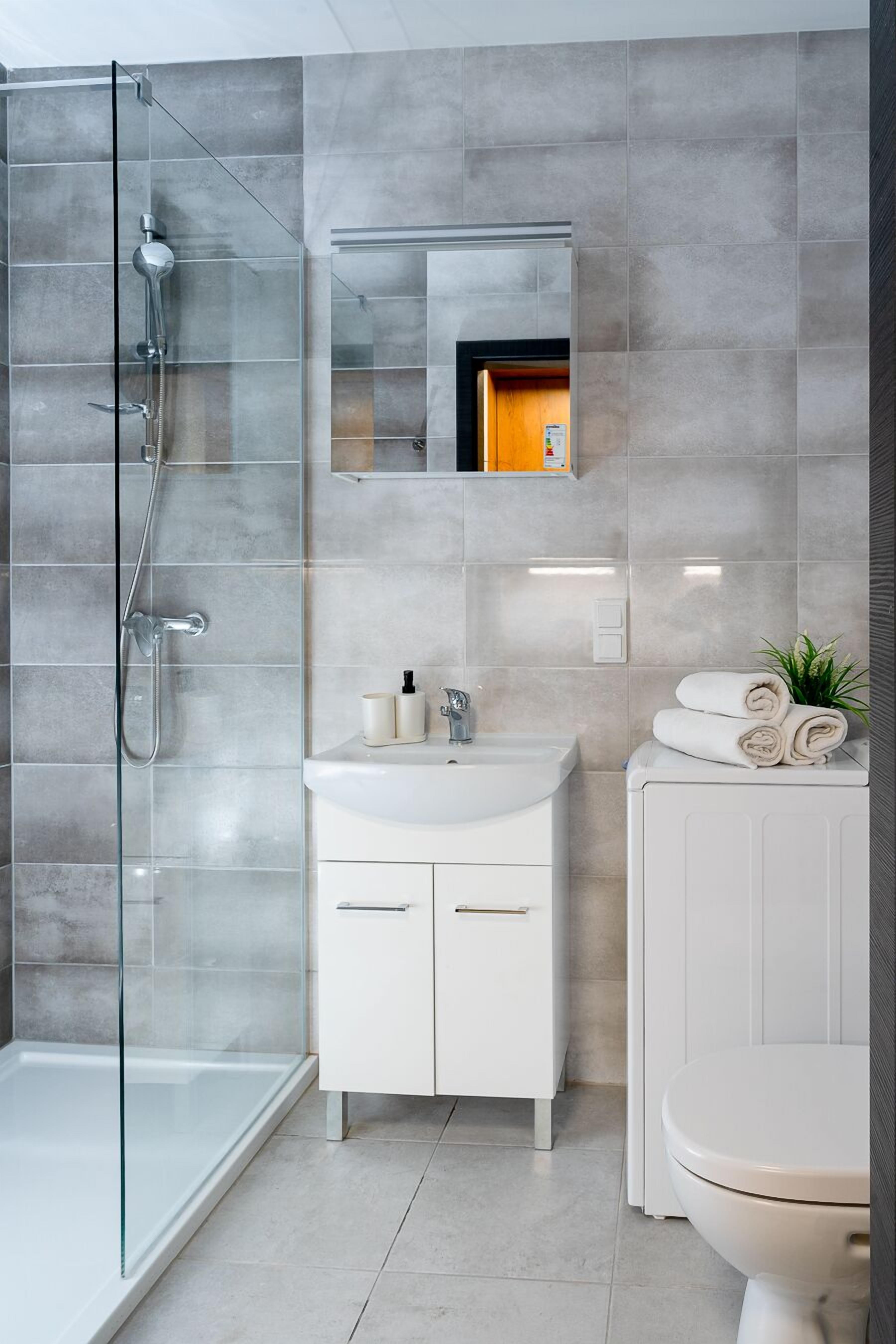 Design Studio | Bathroom | Shower, rainfall showerhead, hair dryer, soap