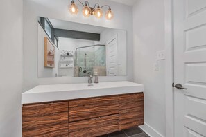 Bathtub, hair dryer, towels, soap