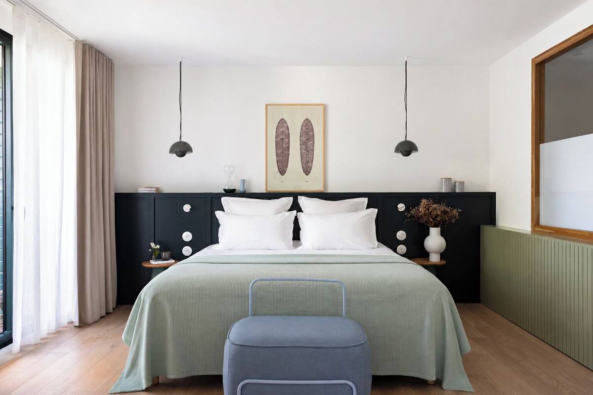 Suite junior | Ropa de cama de alta calidad y artículos del minibar gratis 