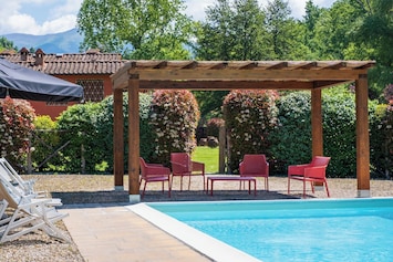 Covered terrace and pool