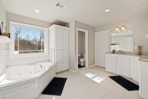 Bathtub, hair dryer, towels