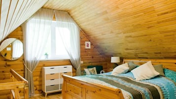 1 habitación y tabla de planchar con plancha