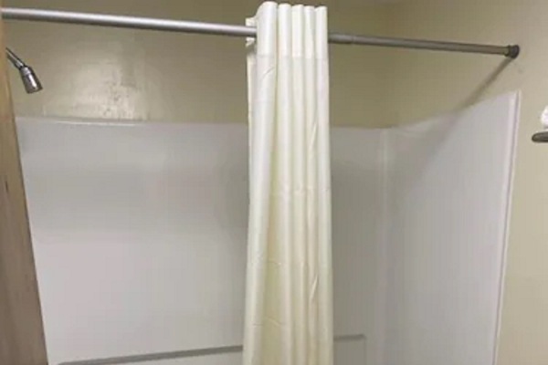 Combined shower/tub, hair dryer, towels, soap