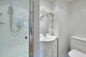 Cottage | Bathroom | Hair dryer, towels, toilet paper