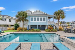 A two-story house with a swimming pool, a covered patio, and a small deck. - Channel Your Inner Beach, Channel House in Cherry Grove with Fantastic Views (North Myrtle Beach)