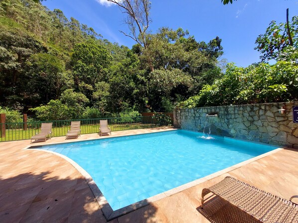 2 indoor pools, outdoor pool, open 10:00 AM to 4:00 PM, pool umbrellas