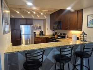 Fridge, microwave, oven, stovetop - Beautiful Beach front condo awaits YOU !!! (Daytona Beach)