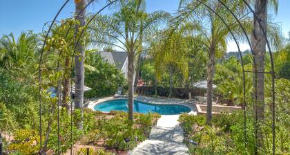 Two Homes, One
Lot Sleeps 16, Pool & Hot Tub Private Villa, 9 miles from beach.