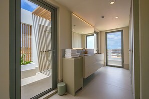 Presidential Suite, 3 Bedrooms, Ocean View | Bathroom | Hair dryer, slippers, towels, soap