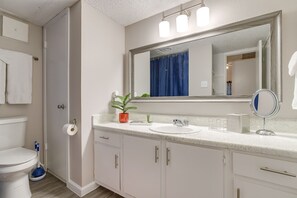 Bathtub, hair dryer, towels