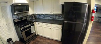 PRIVATE HOT TUB! Stunning updated downstairs home- Amazing Location