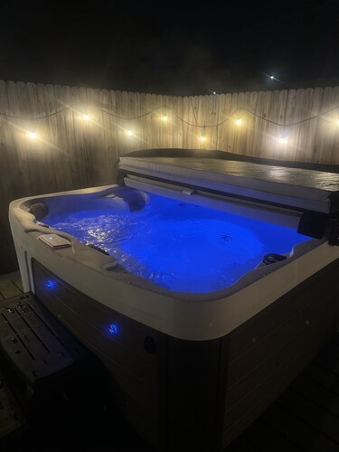 PRIVATE HOT TUB! Stunning updated downstairs home- Amazing Location