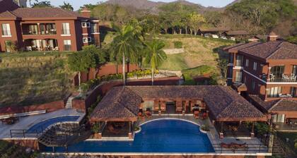 Peek-a-Boo Ocean view Condo at Reserva Conchal