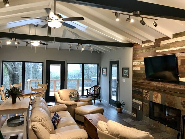 Smart TV, fireplace, DVD player, books