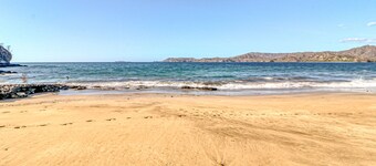 Ideal oceanfront gem with beach access,  WiFi, balcony, grill, & washer/dryer