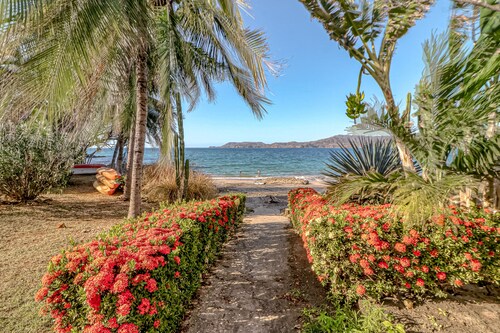 Ideal oceanfront gem with beach access,  WiFi, balcony, grill, & washer/dryer