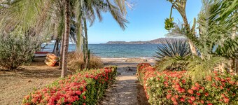 Ideal oceanfront gem with beach access,  WiFi, balcony, grill, & washer/dryer