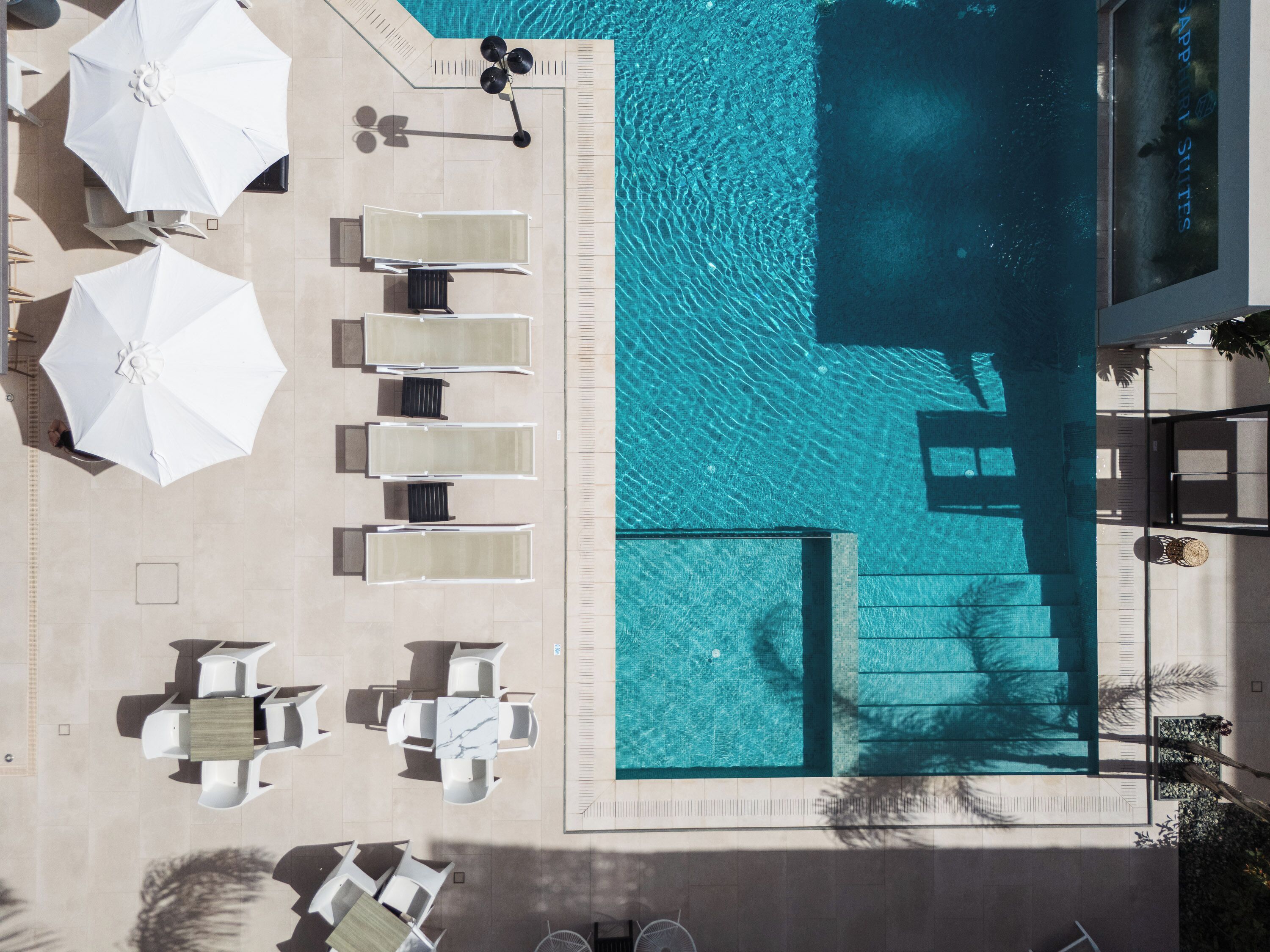 Seasonal outdoor pool, pool umbrellas, pool loungers