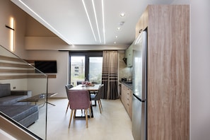 Suite, 2 Bedrooms (Split Level) | Private kitchen | Fridge, oven, stovetop, espresso maker