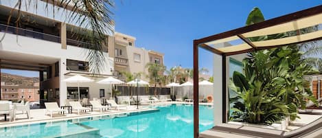 Seasonal outdoor pool, pool umbrellas, sun loungers