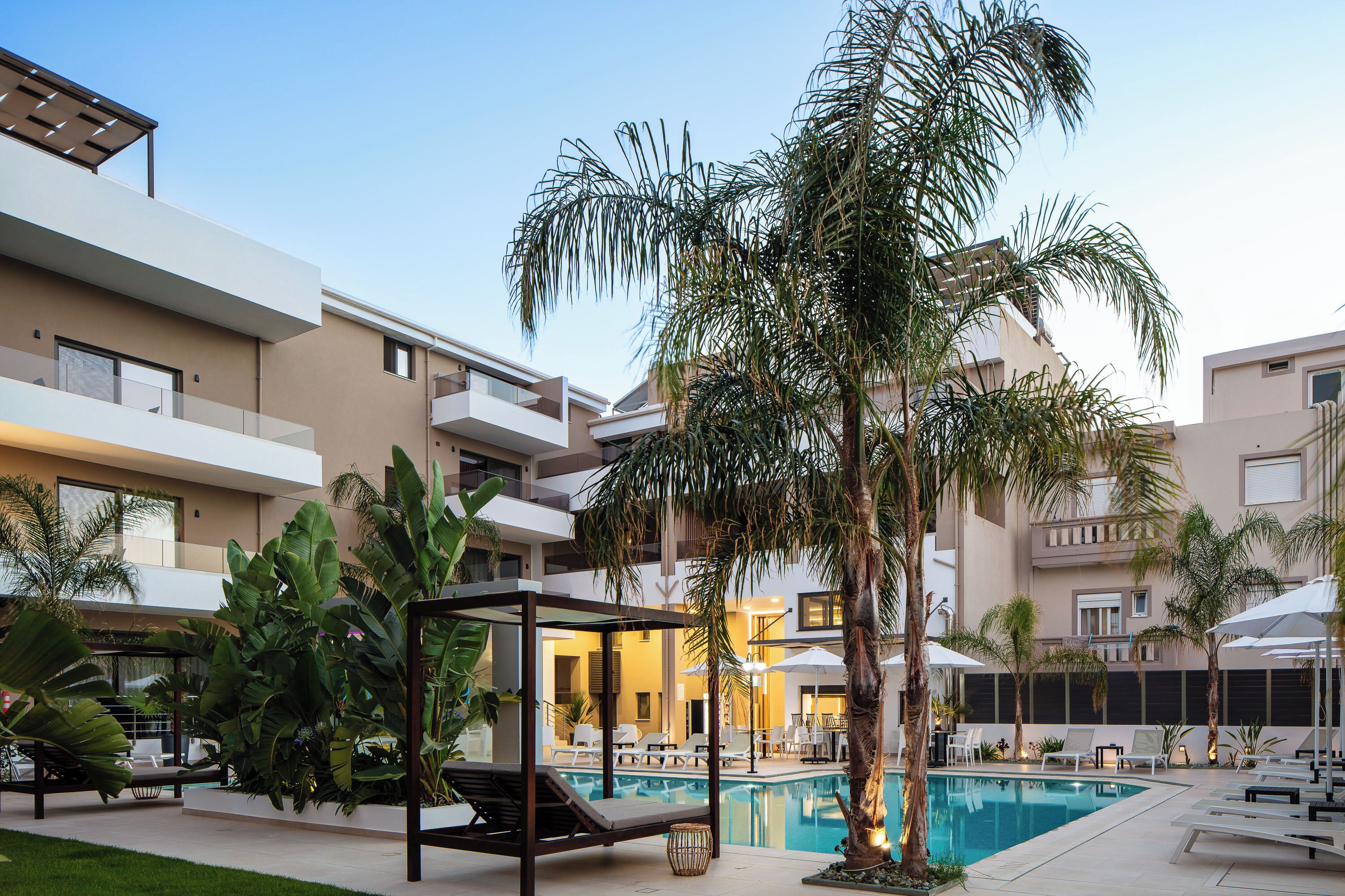 Seasonal outdoor pool, pool umbrellas, pool loungers