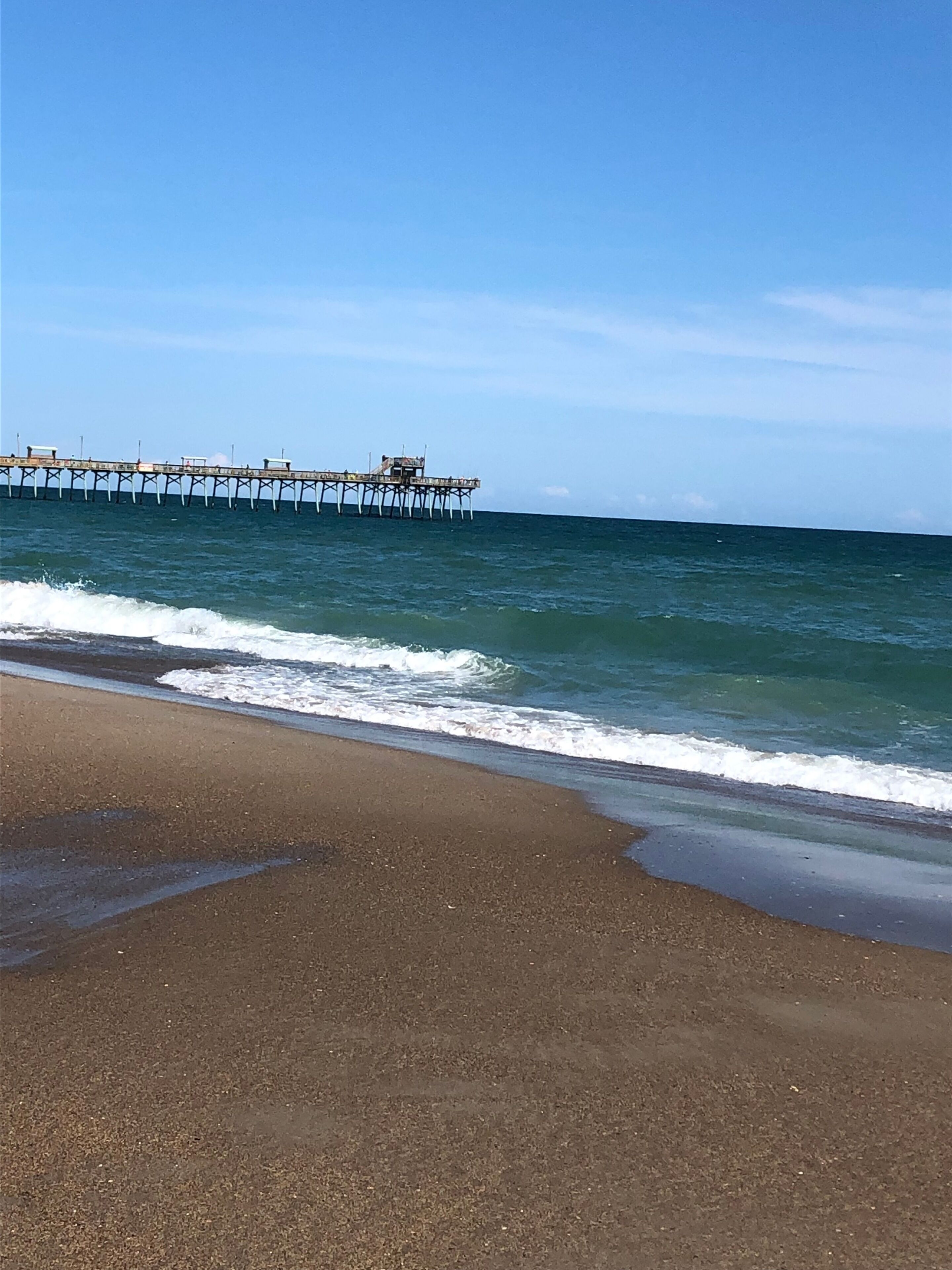 Playa en los alrededores, camastros y toallas de playa 
