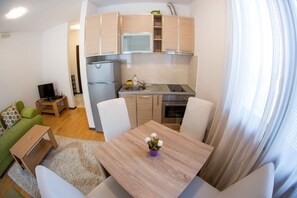 Studio Confort | Restauration dans la chambre