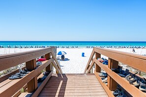 On the beach, sun-loungers