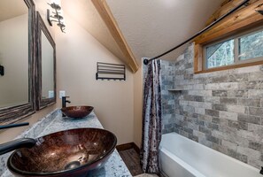 Combined shower/tub, hair dryer, towels, soap