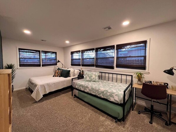 4 bedrooms, desk, iron/ironing board, travel cot