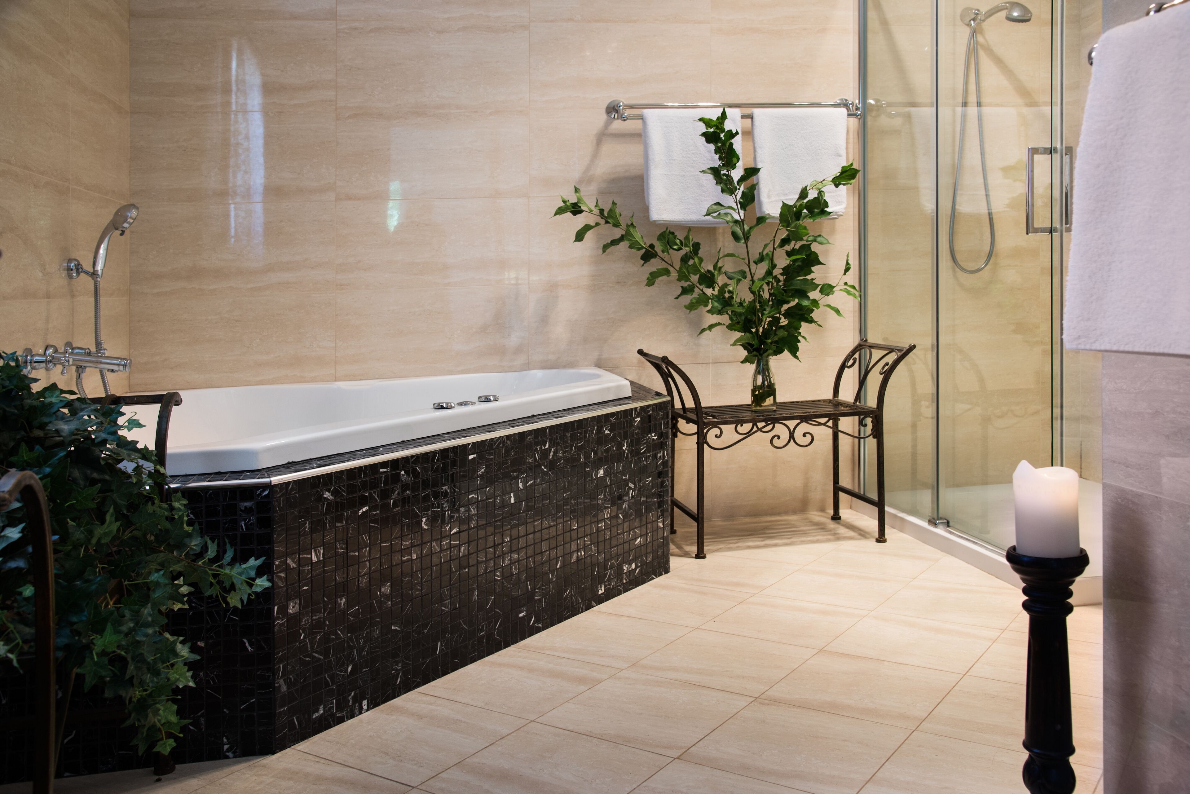 Bathtub, jetted bath, hair dryer, towels