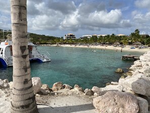 On the beach, sun loungers, beach towels