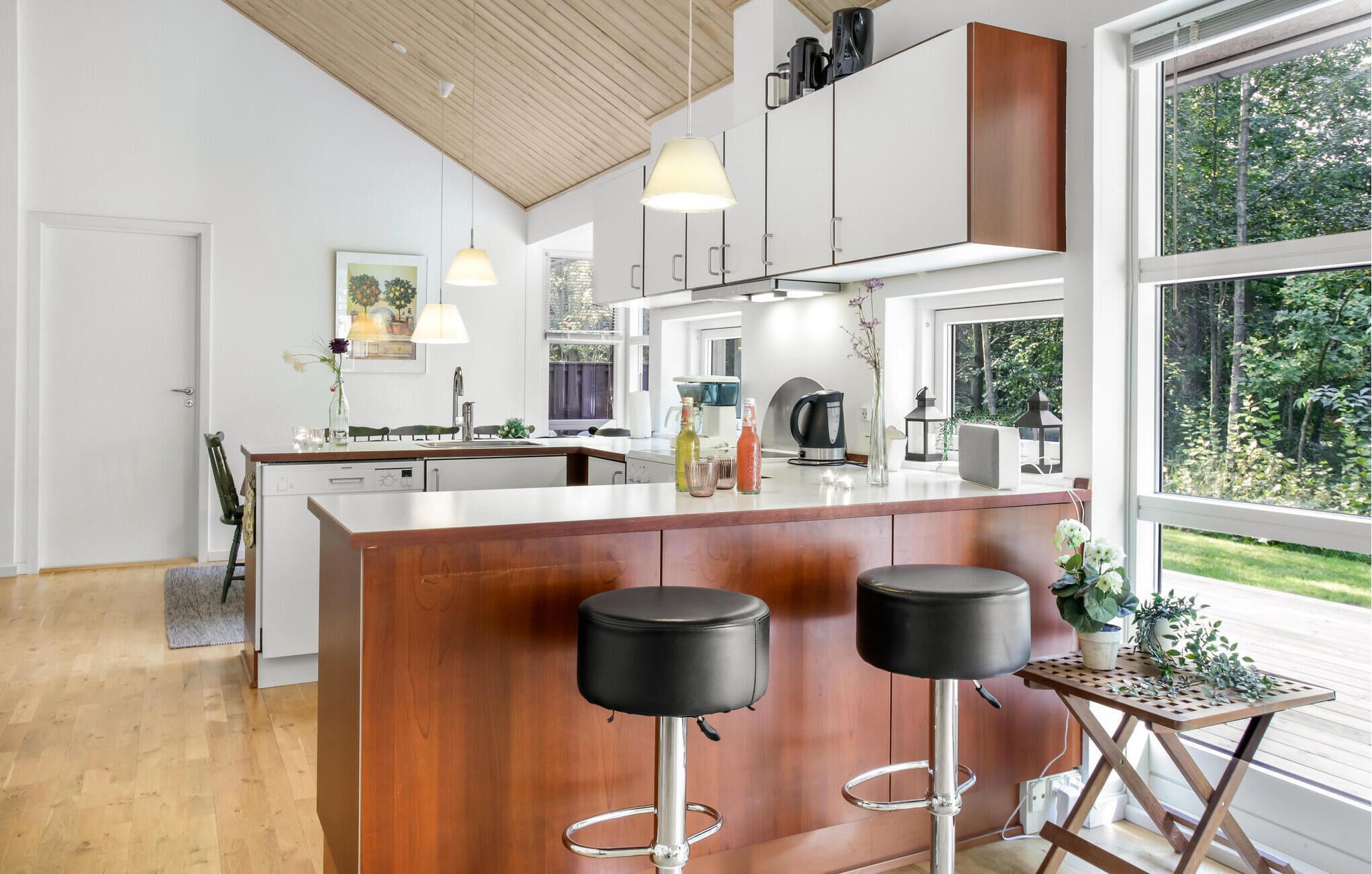 Fridge, stovetop, dishwasher, coffee/tea maker