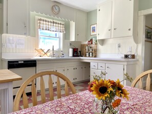 Enjoy a home-cooked meal in this well-equipped kitchen with dishwasher and coffee maker.