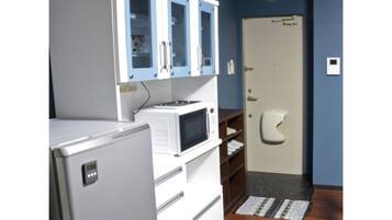 Fridge, microwave, stovetop, cookware/dishes/utensils