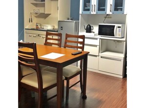 Fridge, microwave, stovetop, cookware/dishes/utensils