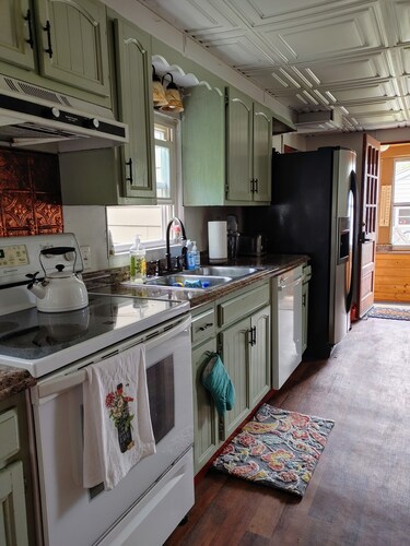 Located directly in central downtown and beach area, fish or kayak from backyard